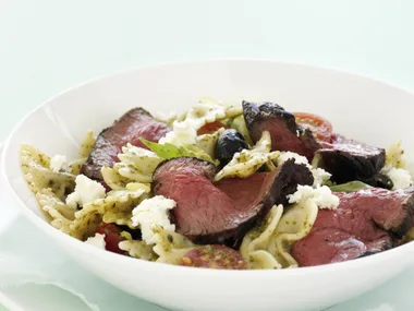 beef fillet with warm tomato, pesto and olive pasta