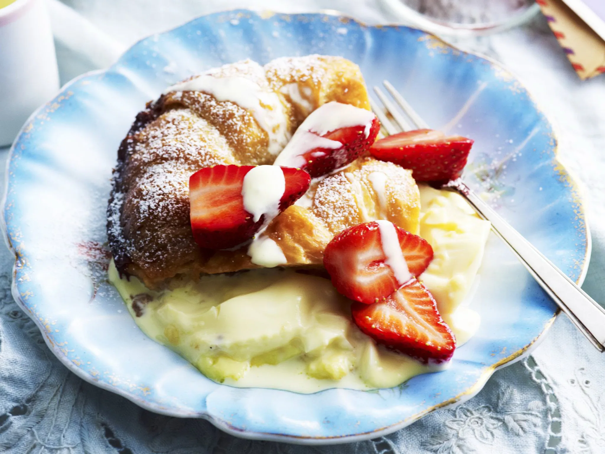 croissant custard pudding withstrawberries