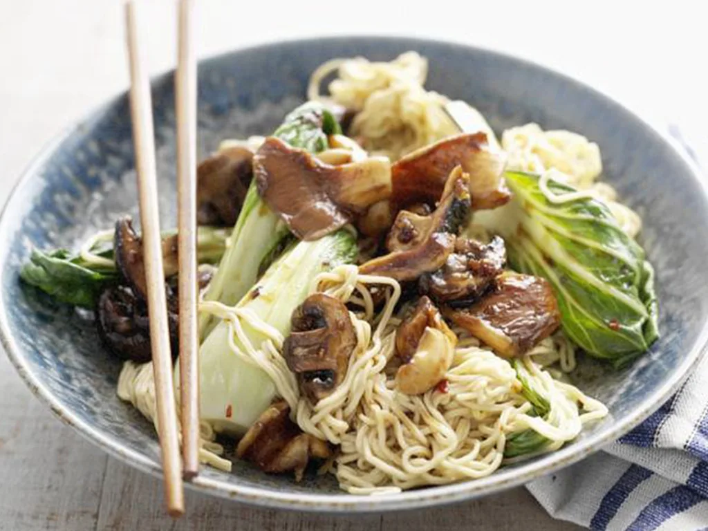 NOODLES AND BUK CHOY WITH MIXED GARLIC MUSHROOMS