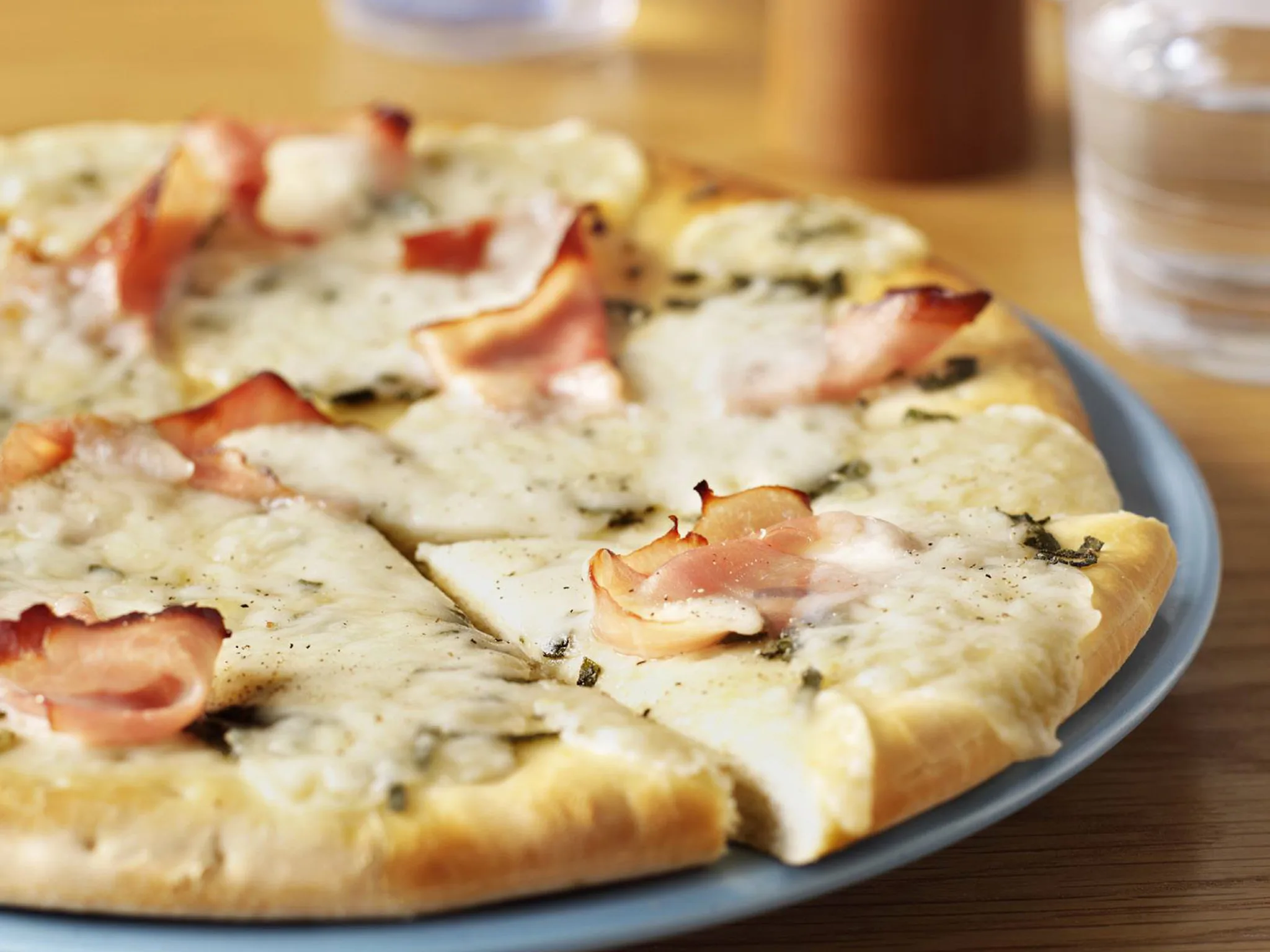 Ham, sage and fontina pizza