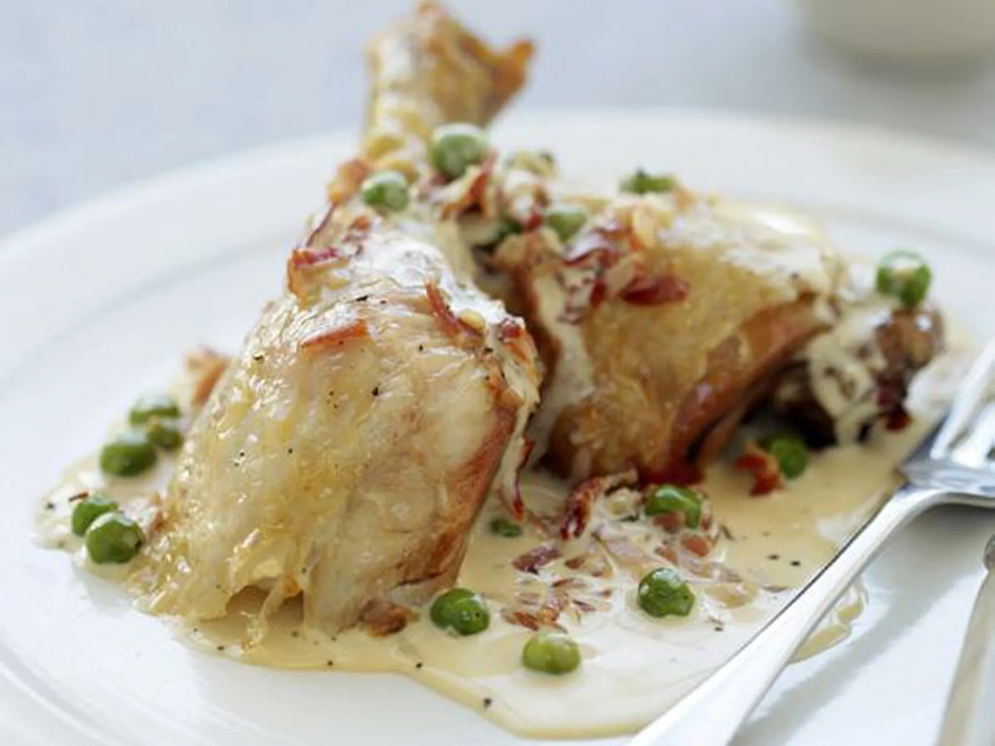 Chicken with creamy pea and pancetta sauce
