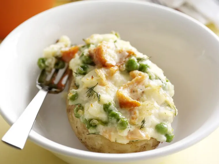 baked potatoes with salmon and peas