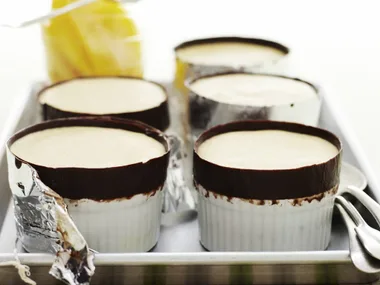 mango soufflés with chocolate collars
