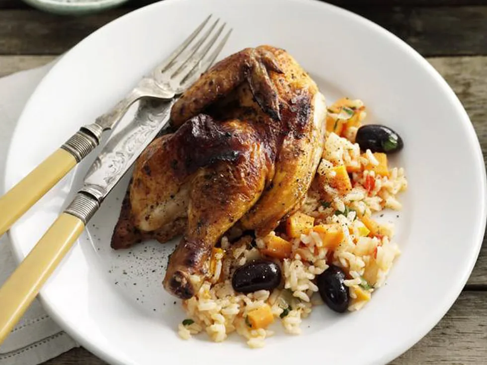 Spatchcock with rice and olives