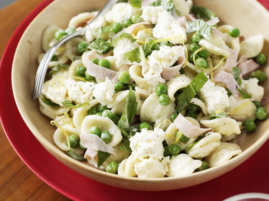 Warm pasta, pea and ricotta salad