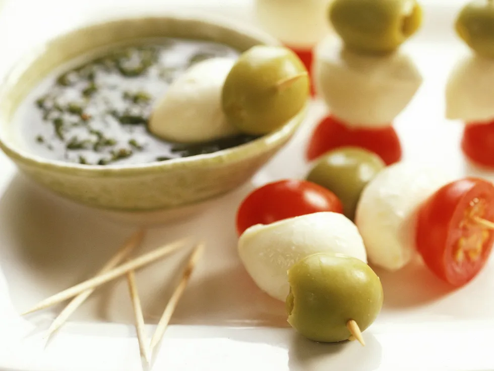 bocconcini, olive andamp; cherry tomato skewers with pesto