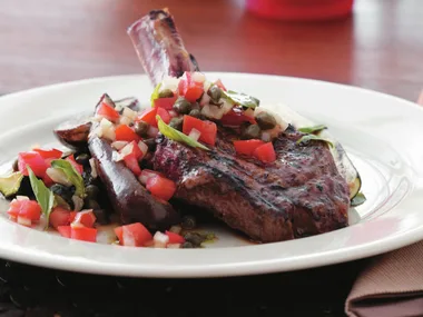 Char-grilled veal with tomato, capers and basil