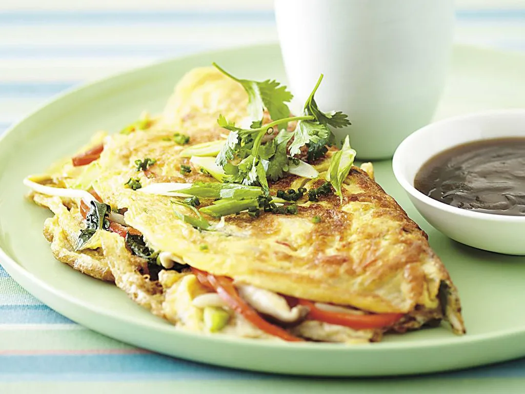 Wok-seared mushroom omelettes