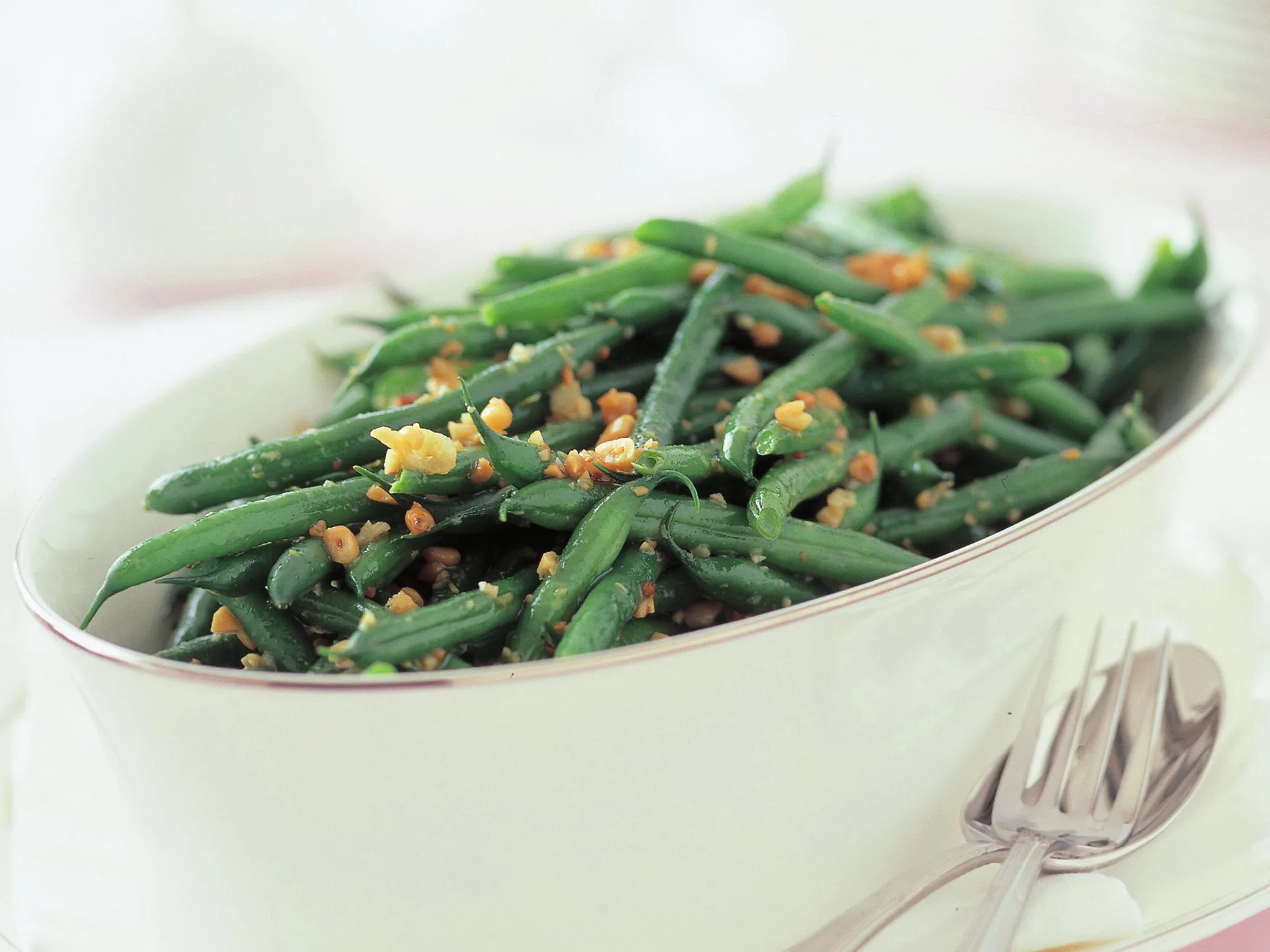 Garlicky beans with pine nuts