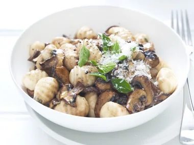 Gnocchi with herb and mushroom sauce