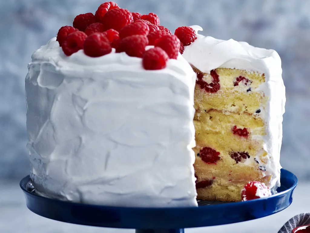 Frosted raspberry and passionfruit layer cake