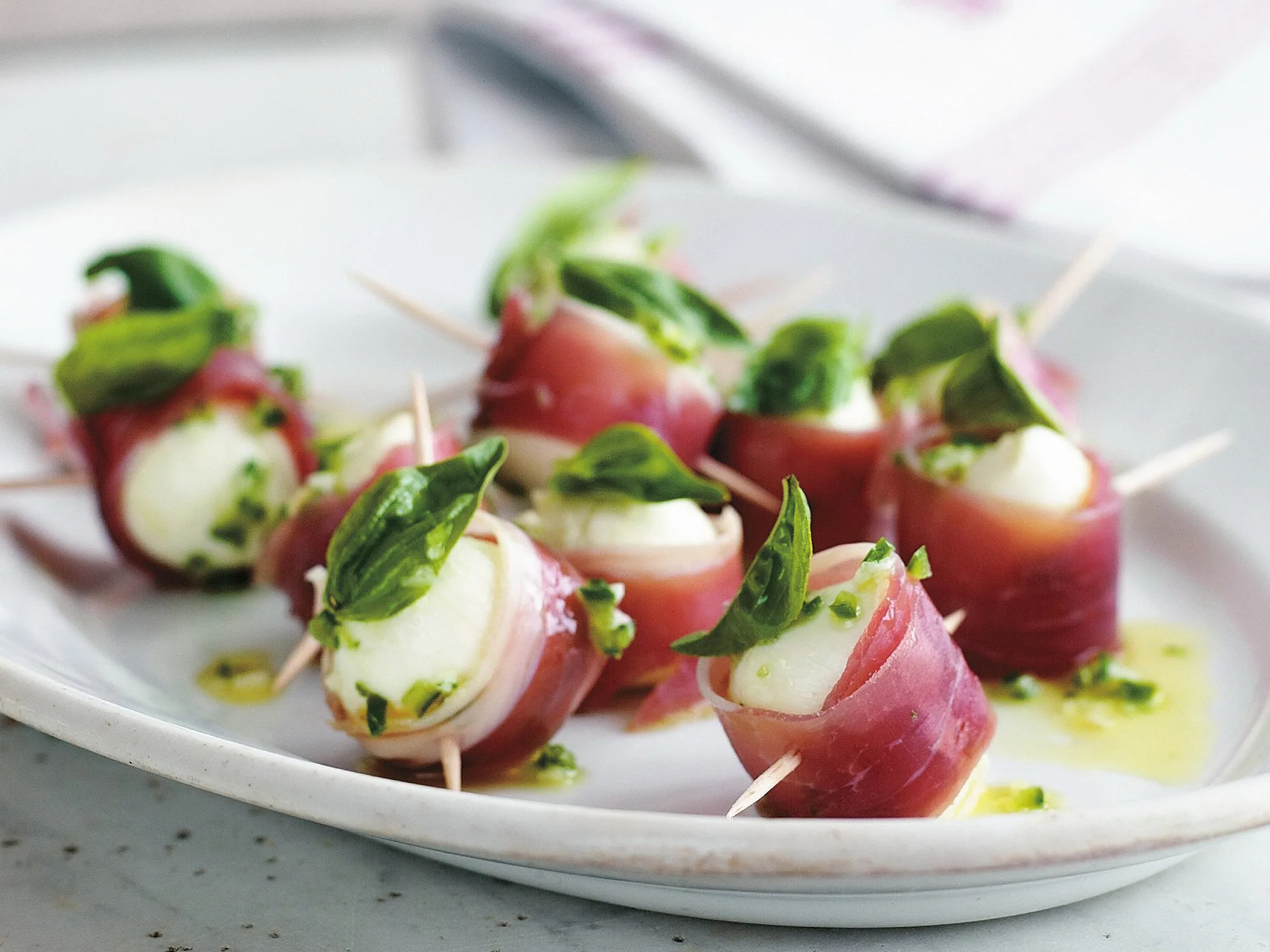 Marinated baby bocconcini with prosciutto