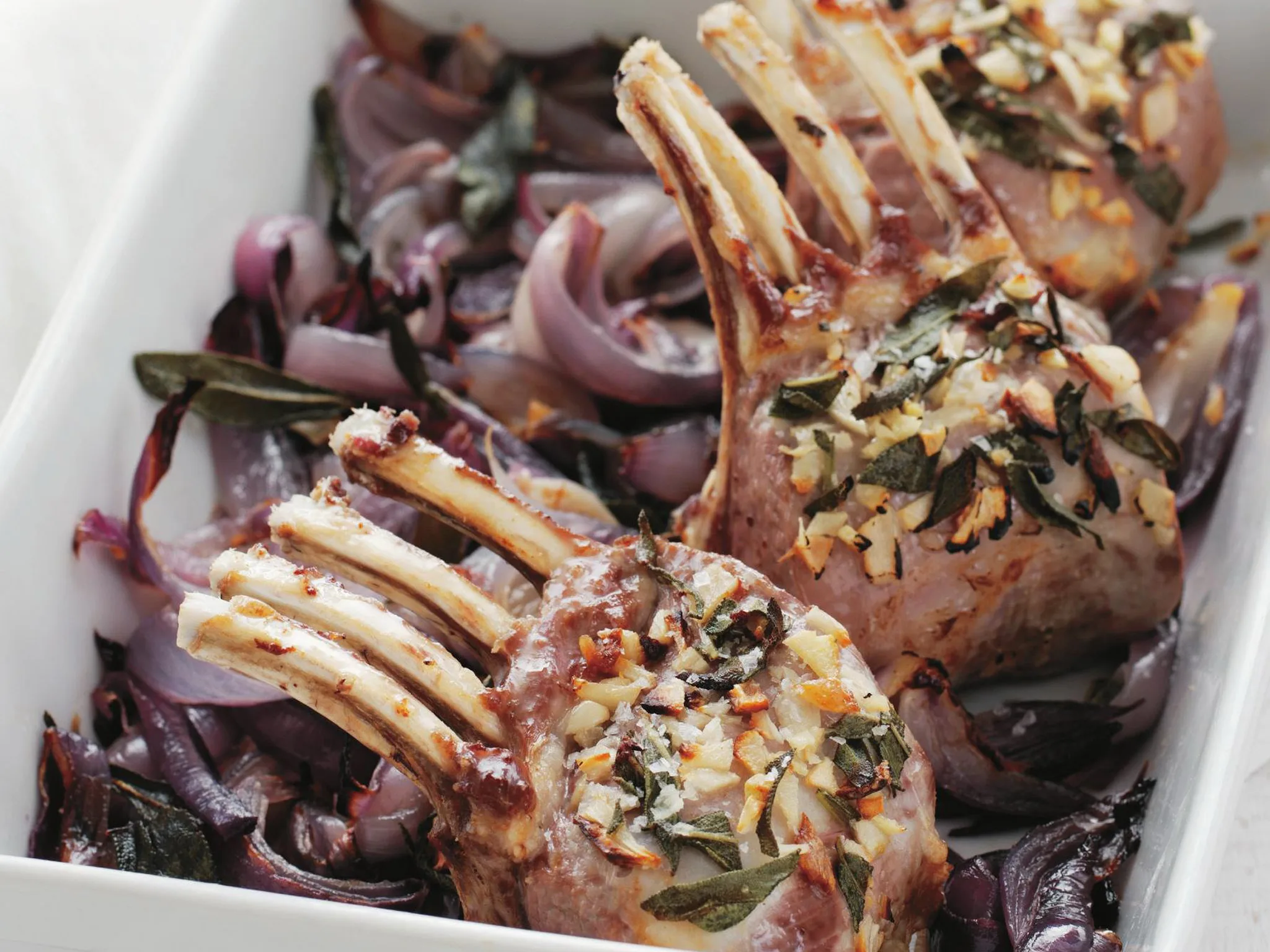 Lamb racks with garlic, sage and red onion