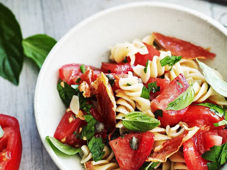 Pasta salad with tomato and crisp prosciutto