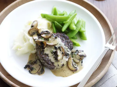 Pepper steaks with mushroom sauce and creamy mash