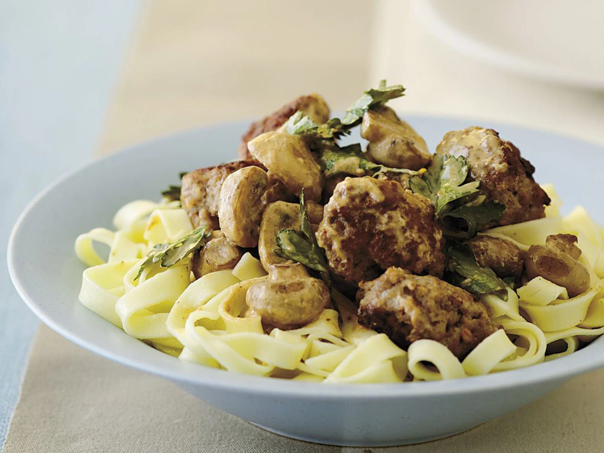 Pork and veal meatballs with mushroom sauce