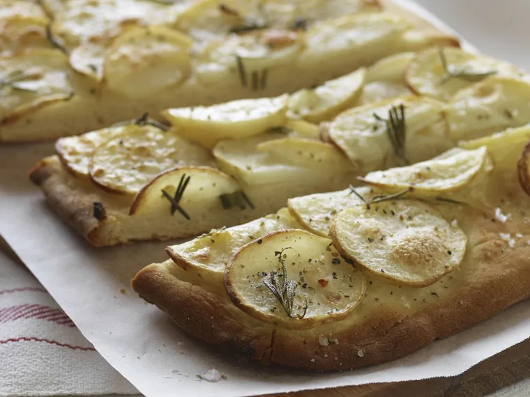 Potato and herb pizzas