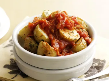Roasted thyme potatoes with spicy sauce
