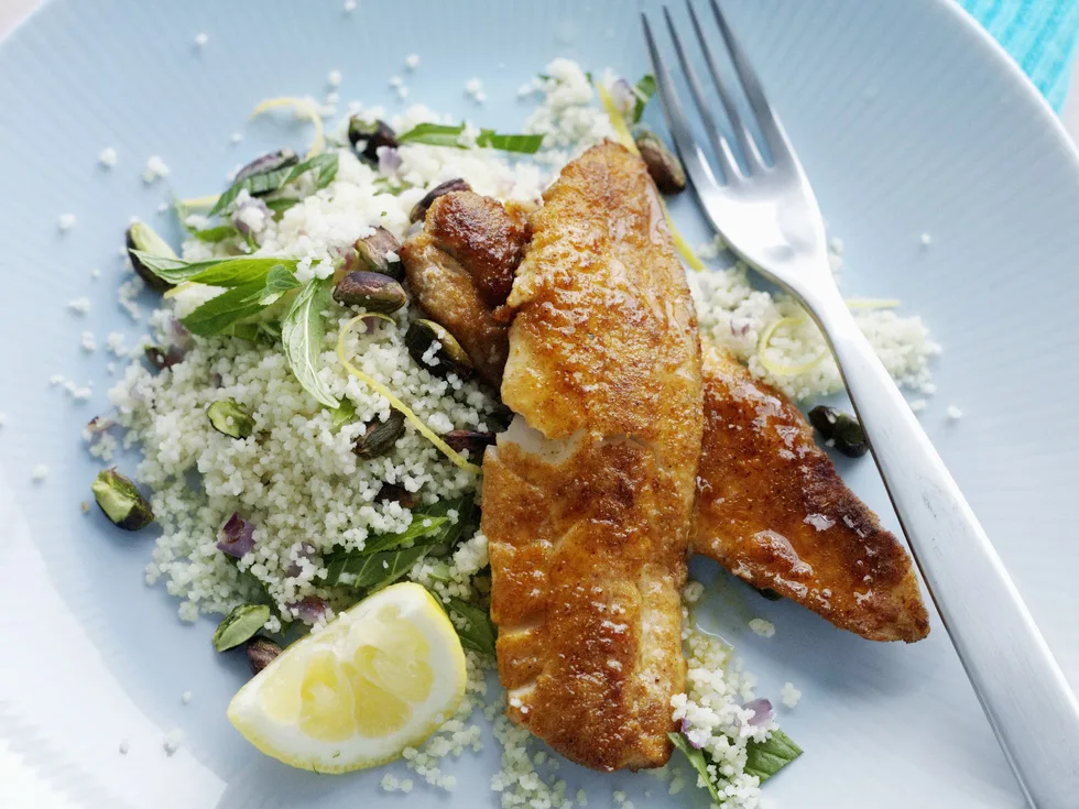 Spiced fried fish with lemon pistachio couscous