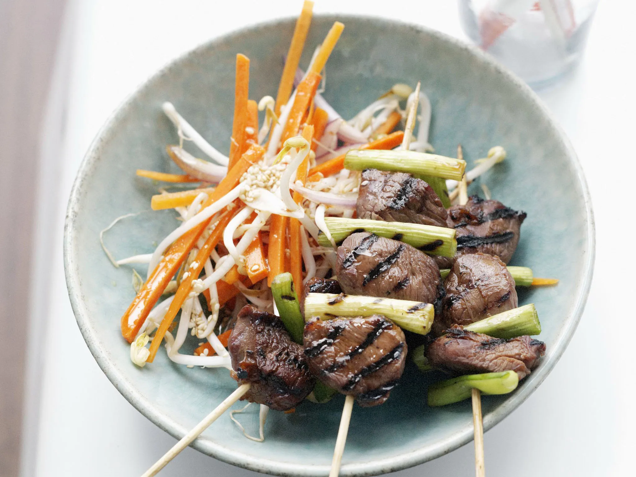 Teriyaki lamb with carrot salad
