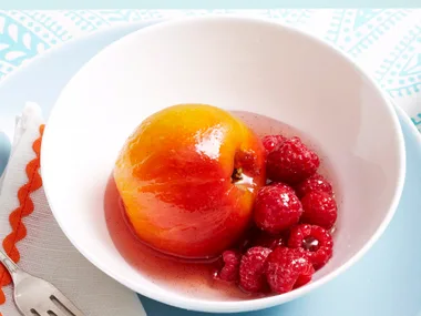 Poached peaches, raspberries and cream