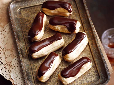 Chocolate and caramel eclairs