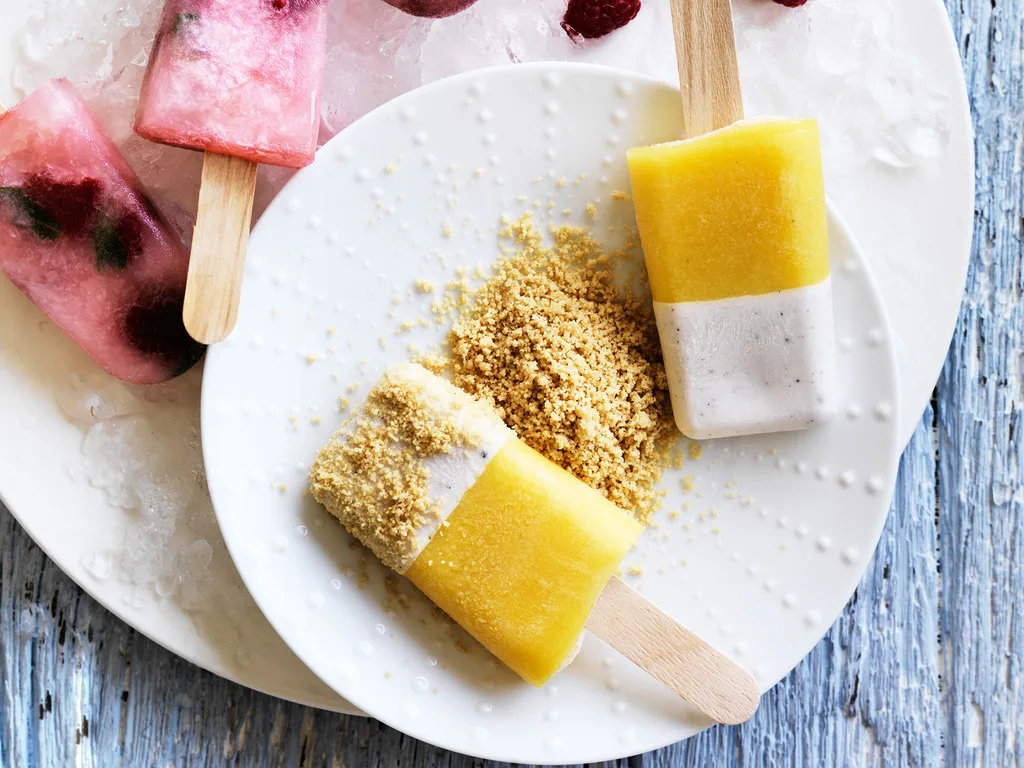 Coconut and mango ice-blocks with biscuit sand