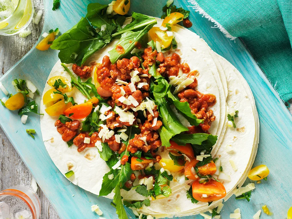 Rocket and tomato lamb burritos