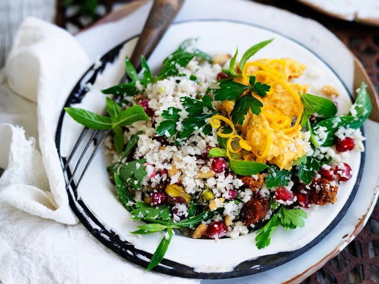 Cauliflower ‘couscous’ with roasted carrot hummus