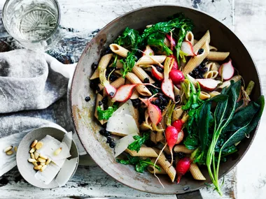 Pasta with radishes and their tops