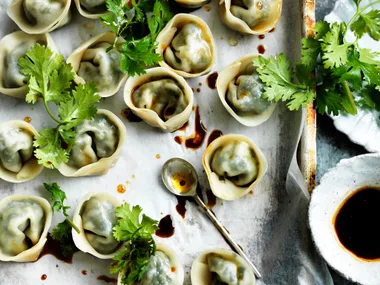 Green dumplings with soy chilli dipping sauce