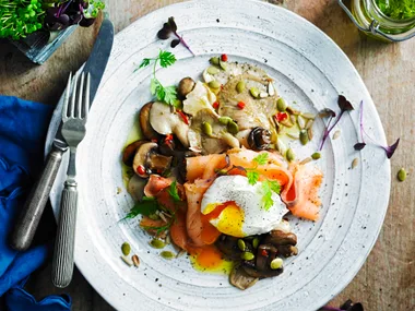 Mixed mushrooms with smoked salmon, egg and seed topping