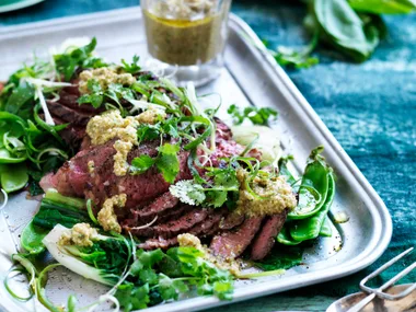 Beef with cashew nam jim and Asian greens