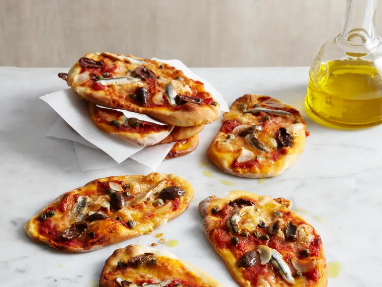 Puttanesca pizzettas