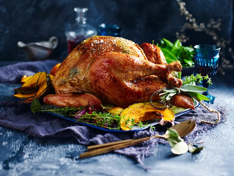 herbed butter roast turkey with prosciutto and pear stuffing