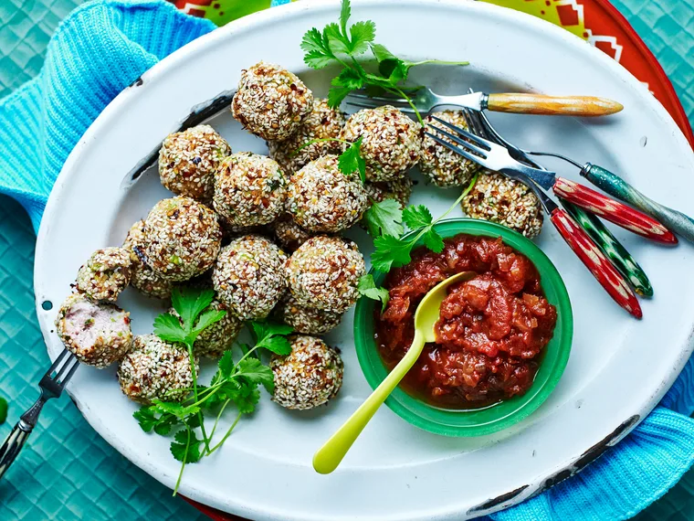 Chicken and sesame balls with sweet and sour sauce