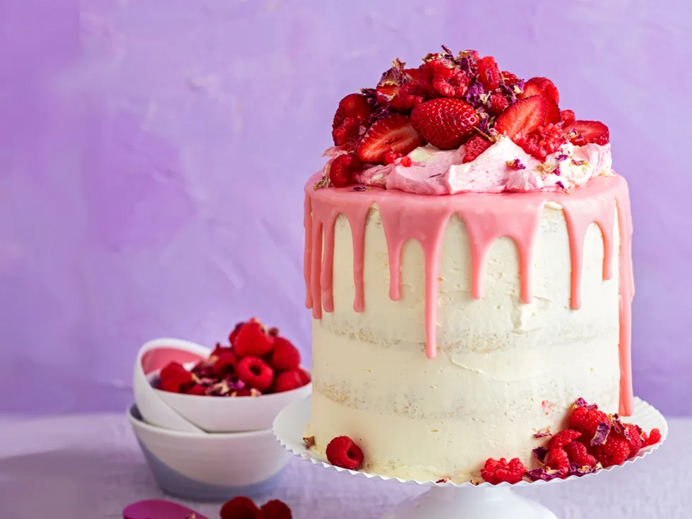 Layered pretty in pink drip cake