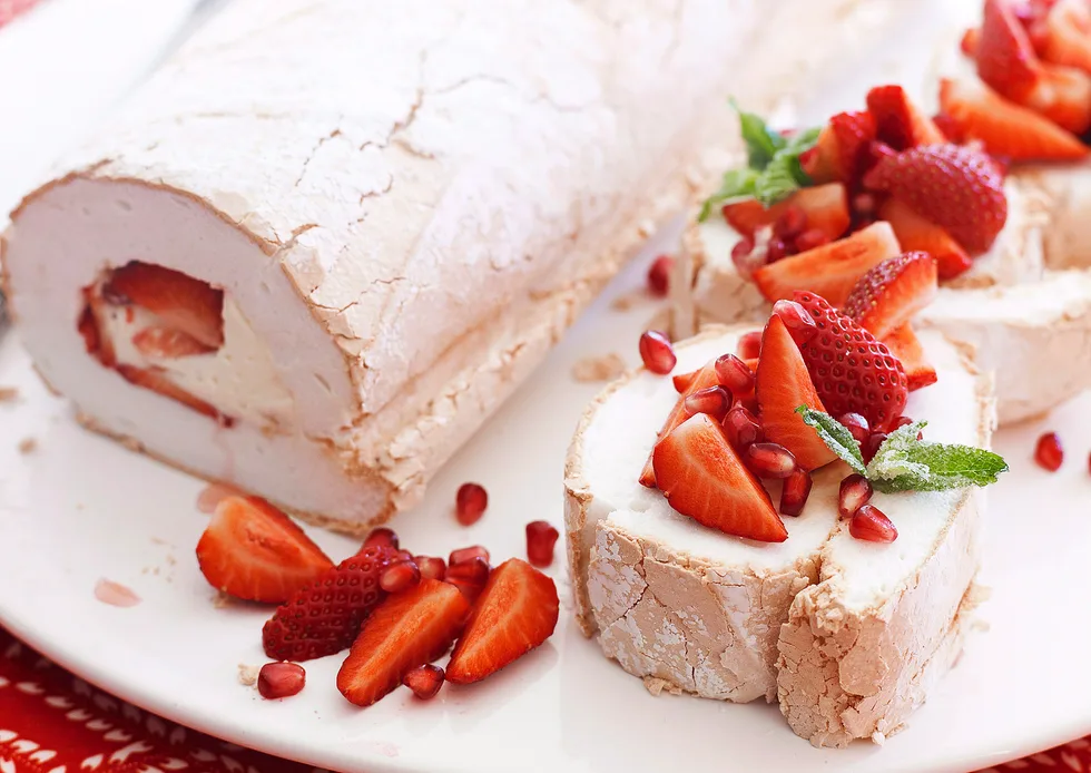 Strawberry and pomegranate pavlova roulade