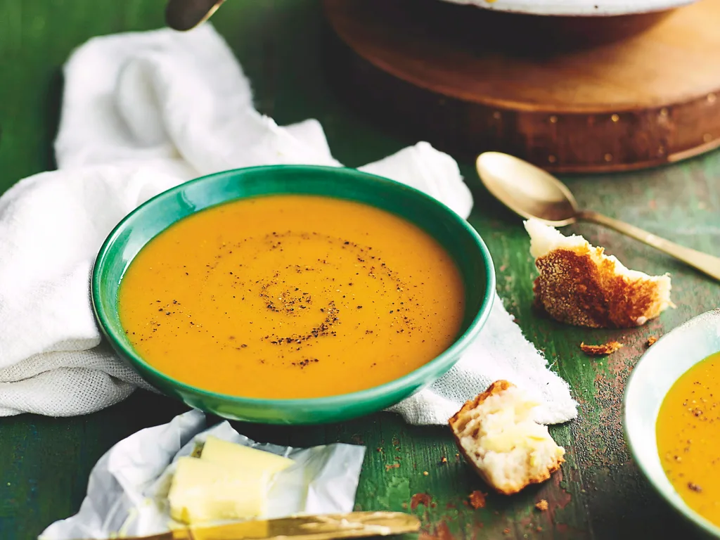 Bowl of pumpkin and potato soup