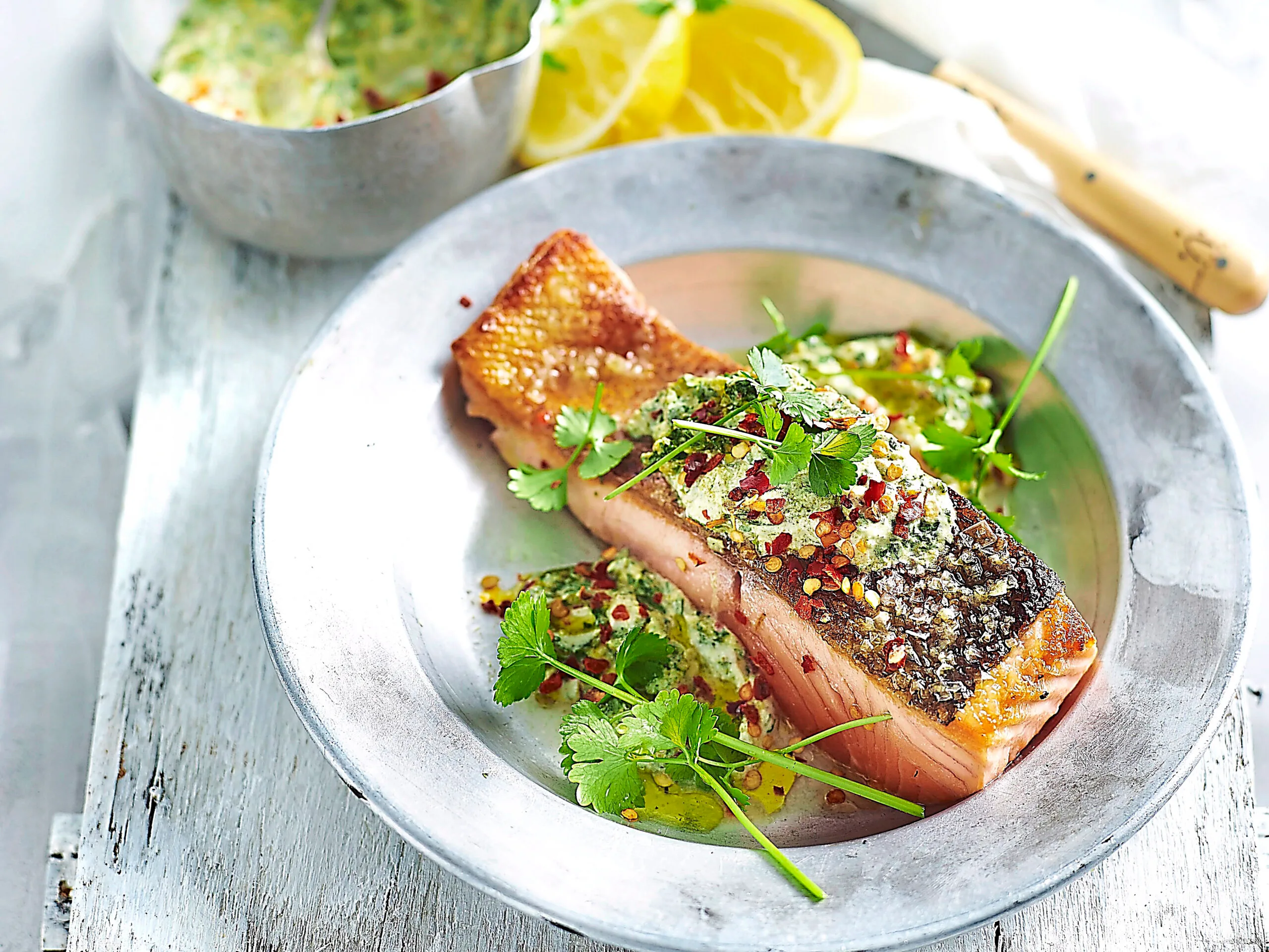 Crispy skinned salmon with lemon, dill and caper sauce