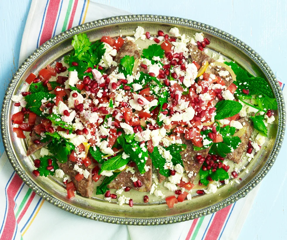 kibbeh with tomato and pomegranate salad