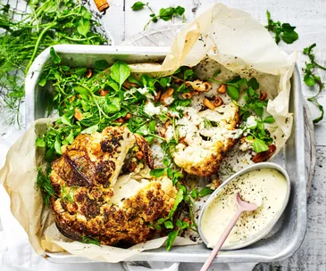 Whole cauliflower with creme fraiche dressing