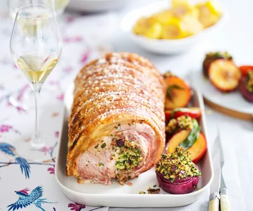 Crispy crackling pork with sweet onions and plums