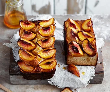 Flourless almond, peach and orange blossom loaves