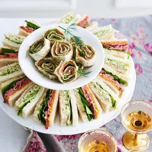 Chicken and cucumber sandwiches on a platter
