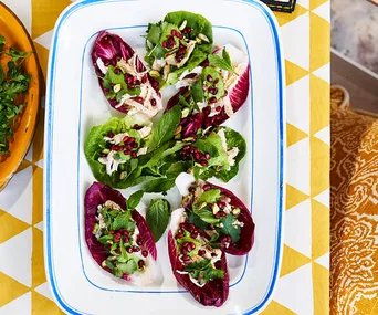 Poached chicken salad with green tahini dressing