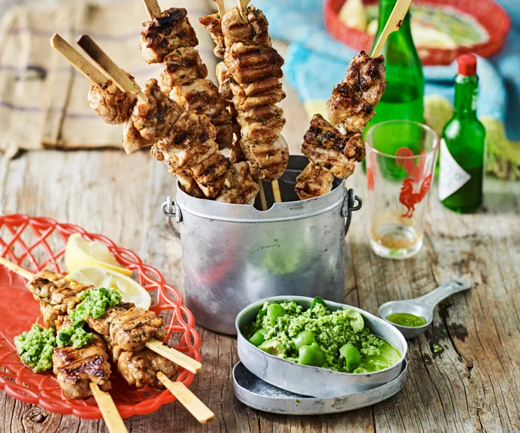 Chicken skewers with green olive dressing