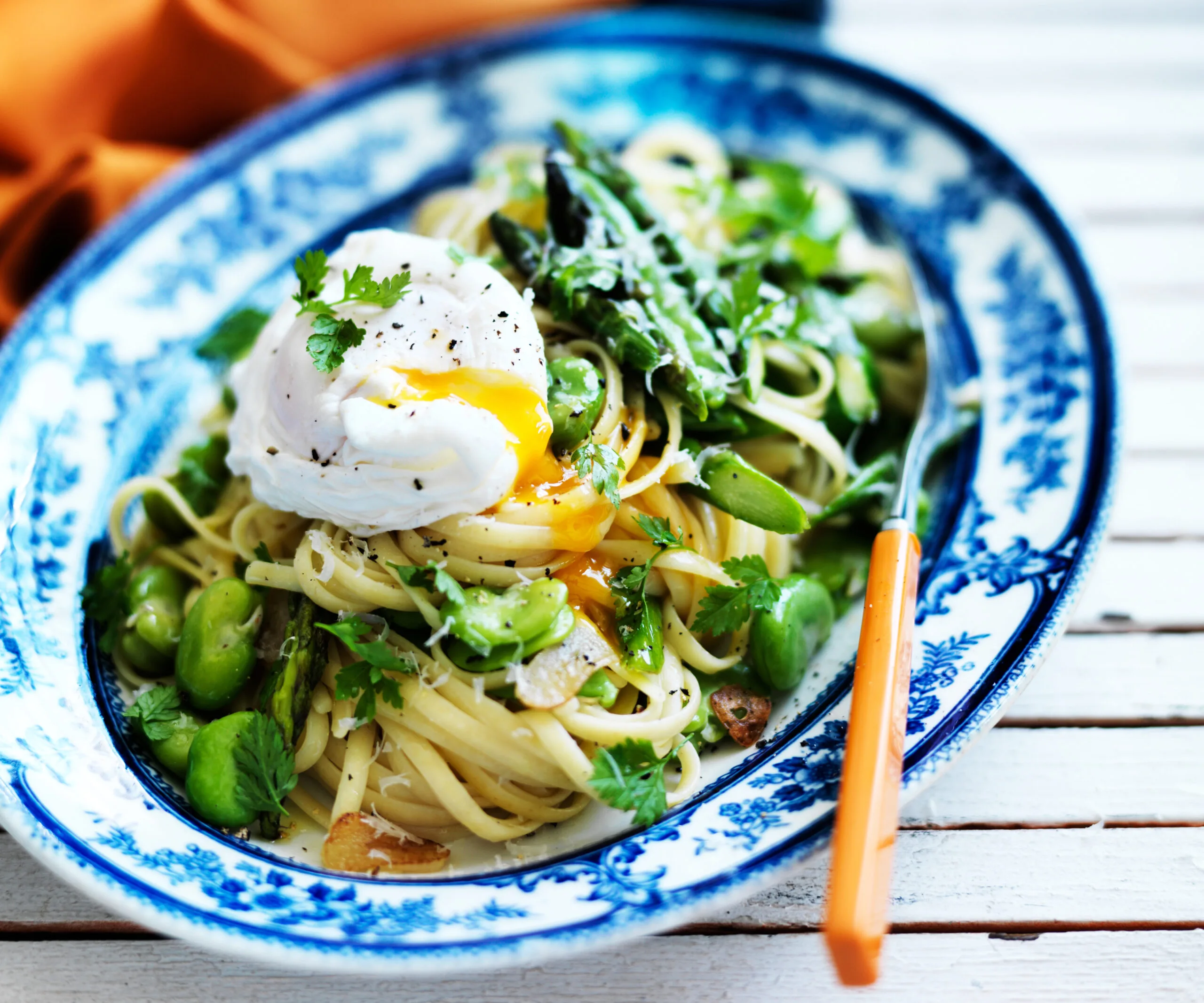 Linguine primavera and poached eggs-image