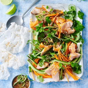 A large platter with bang bang salmon salad