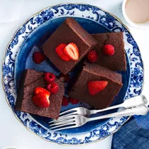 square of Mississippi mud cake with berries